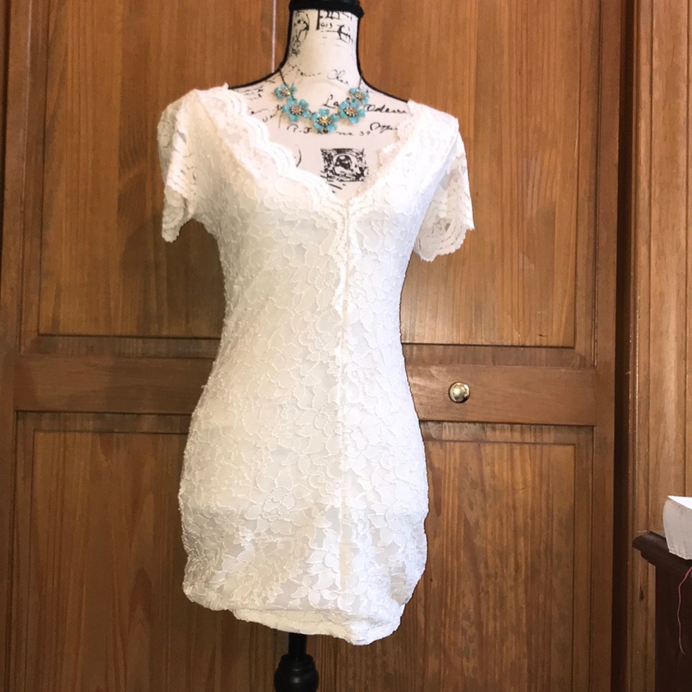 White lace dress from Urban Outfitters.
